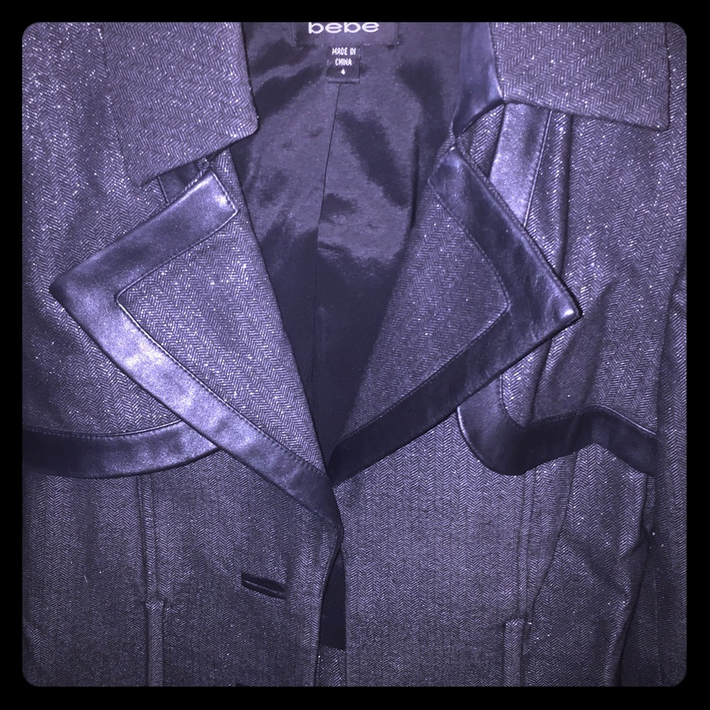 Bebe skirt suit, with leather like trim. $22